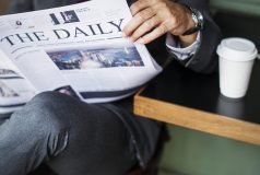 businessman-reading-daily-news